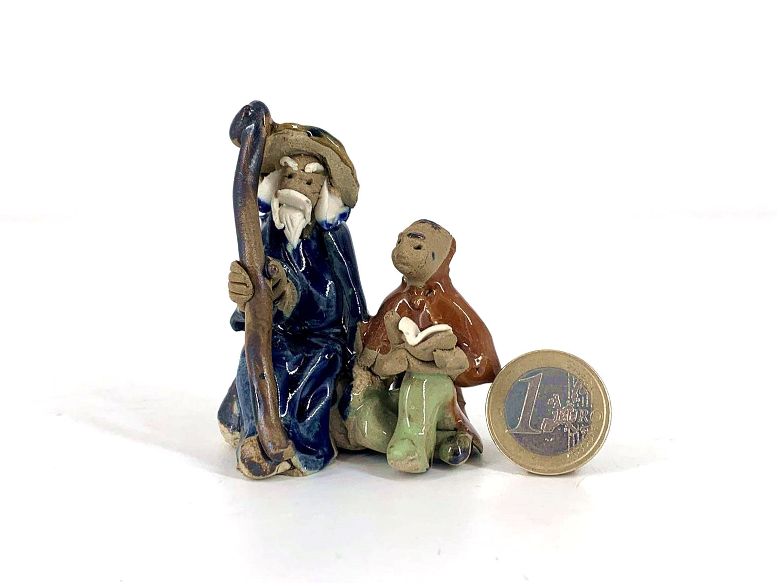Figura Anciano y niño 6.5 cm F25/1